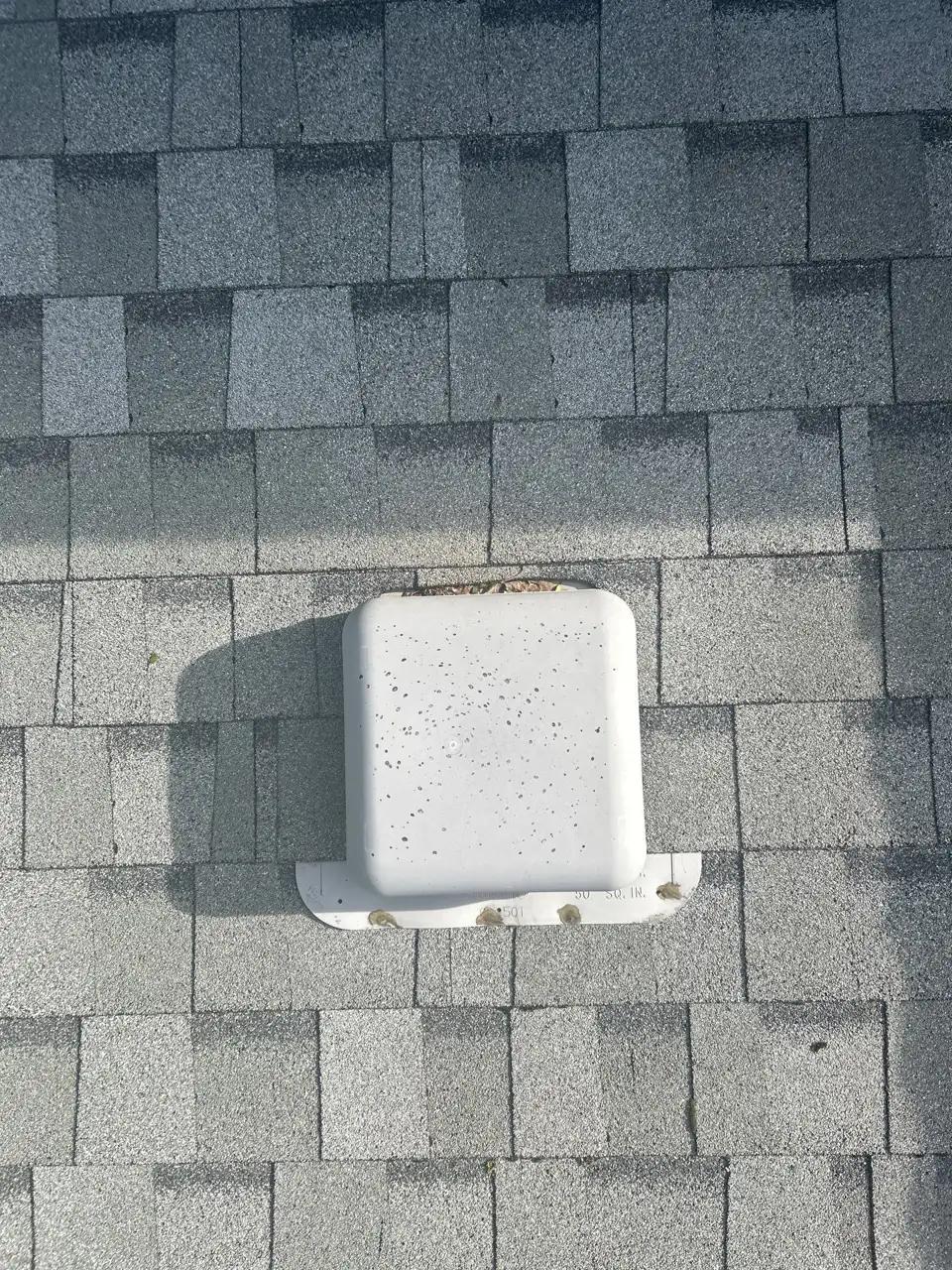 Detailed roof inspection on a Sherwood Park home showing shingles, a skylight, and vents