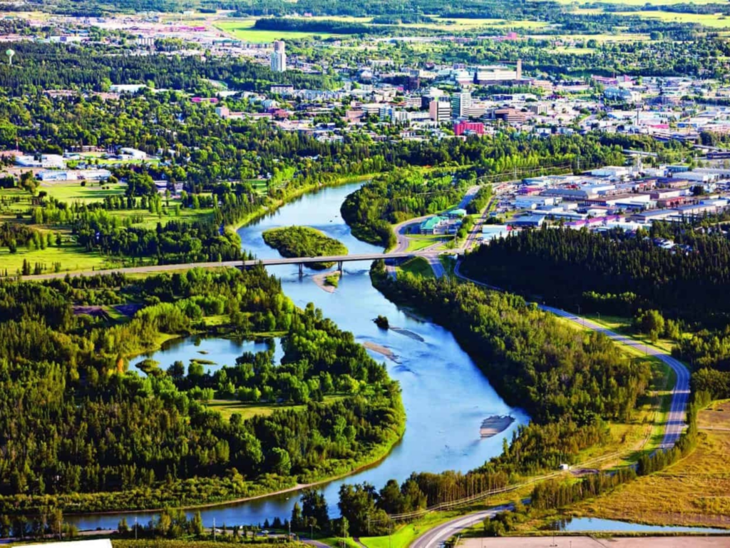 Aerial view of a river winding through Red Deer, AB